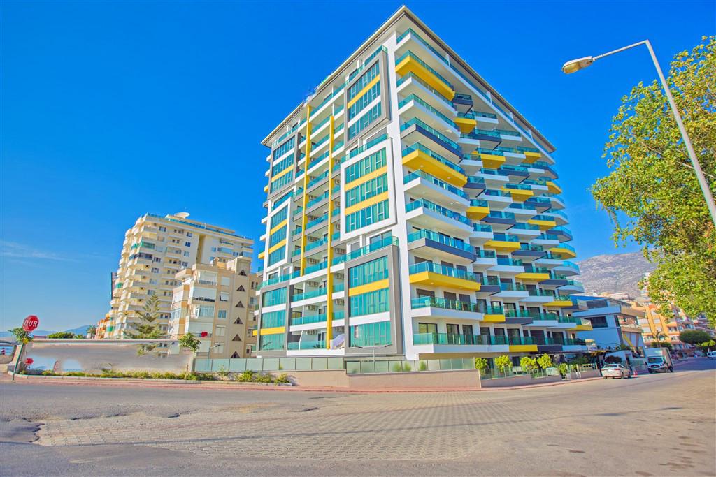 One-bedroom apartment on the first line in Mahmutlar - Фото 2