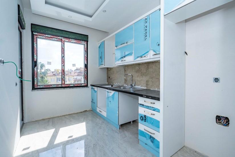 New 2 + 1 apartment in a luxury complex in the center of Alanya - Фото 18