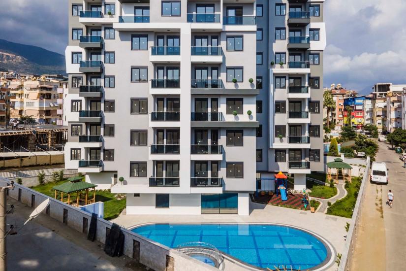 New 2 + 1 apartment in a luxury complex in the center of Alanya - Фото 2