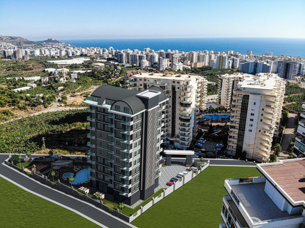 Apartments in a modern complex in the green area of Mahmutlar - Фото 13