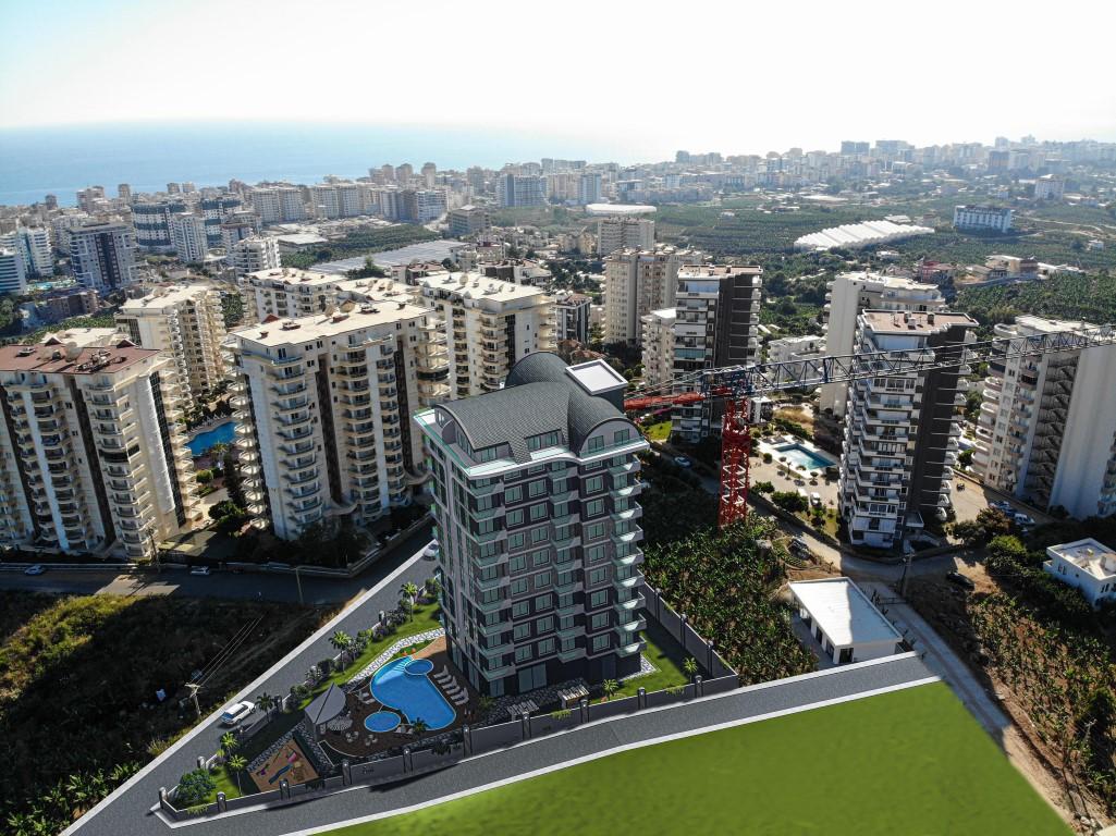 Apartments in a modern complex in the green area of Mahmutlar - Фото 14