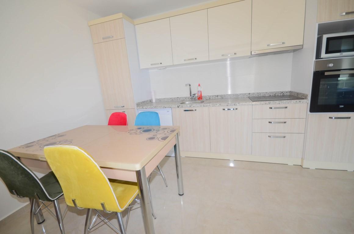 Furnished 1 + 1 apartment in a complex with rich infrastructure in Mahmutlar area - Фото 8