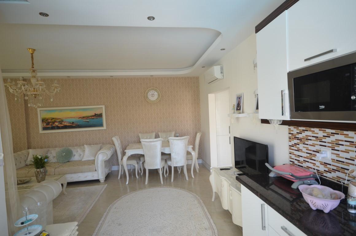 Furnished apartment 2 + 1 with European area of Alanya Mahmutlar - Foto 7
