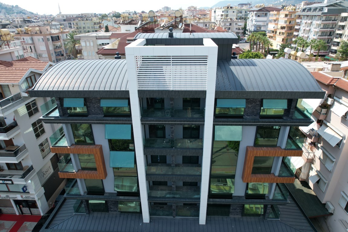 An investment-attractive project in the center of Alanya, just 400 meters from the sea - Фото 4