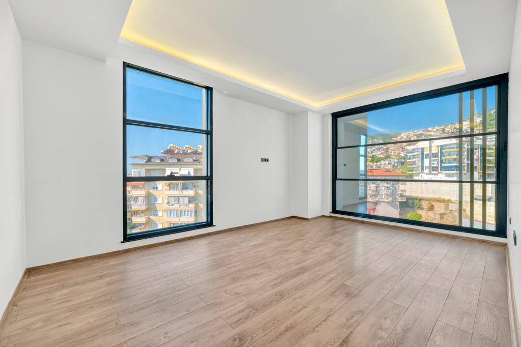 Two-bedroom apartment in a new residential complex in the center of Alanya - Фото 10