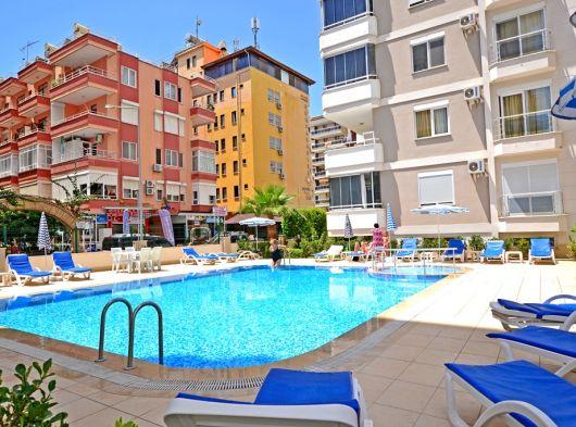 65 m2 Apartment layout, 150 meters from the sea in Mahmutlar, Alanya - Фото 9