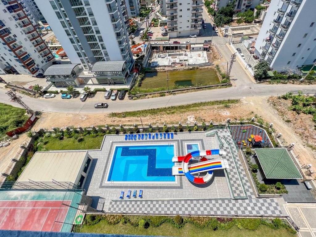 Three-room apartment in a new residential complex in Mahmutlar - Фото 5