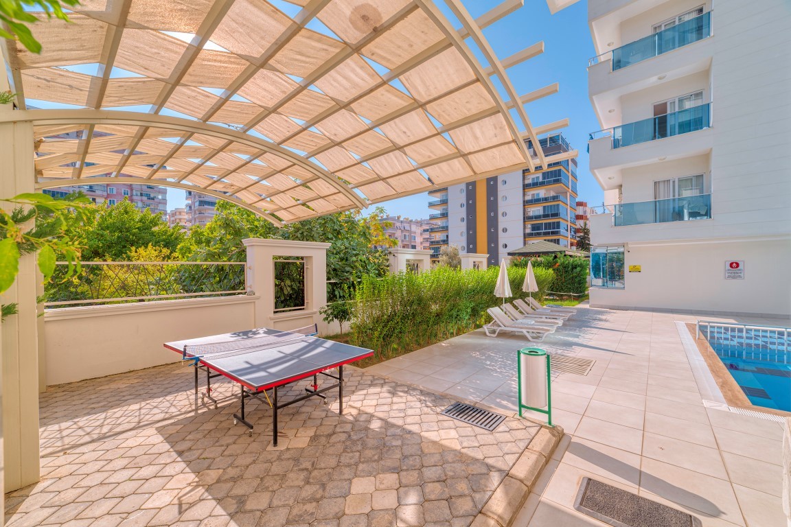 Apartments with glazed terraces, 300 meters from the sea in Mahmutlar - Фото 6