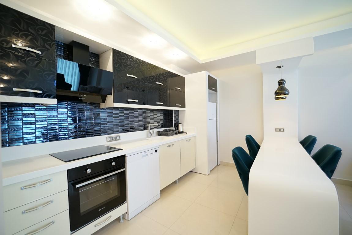 Three-room apartment in a complex with rich infrastructure and sea view in Mahmutlar - Фото 5