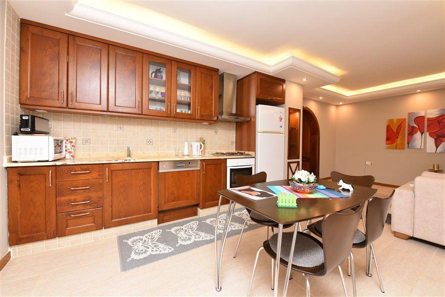 Two-bedroom furnished apartment 50 meters from the beach in Mahmutlar, Alanya - Фото 4