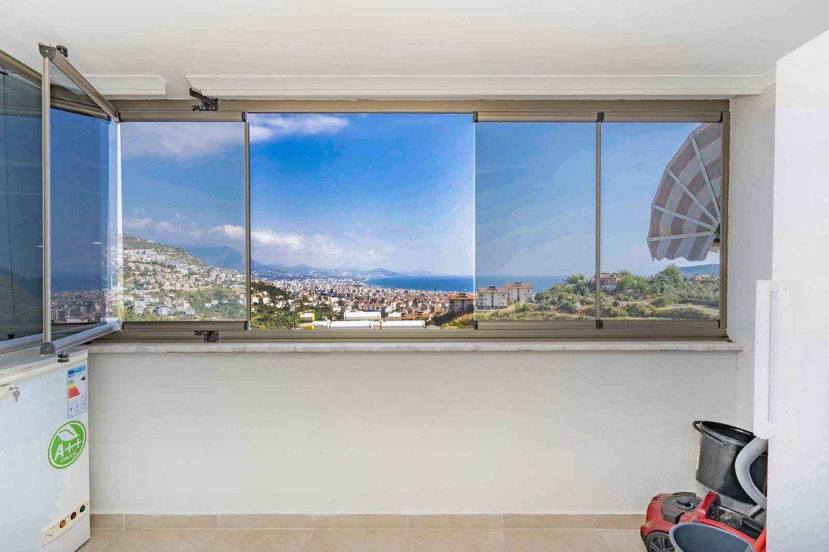 Stylish apartment with glazed terraces and sea view in the center of Alanya - Фото 19