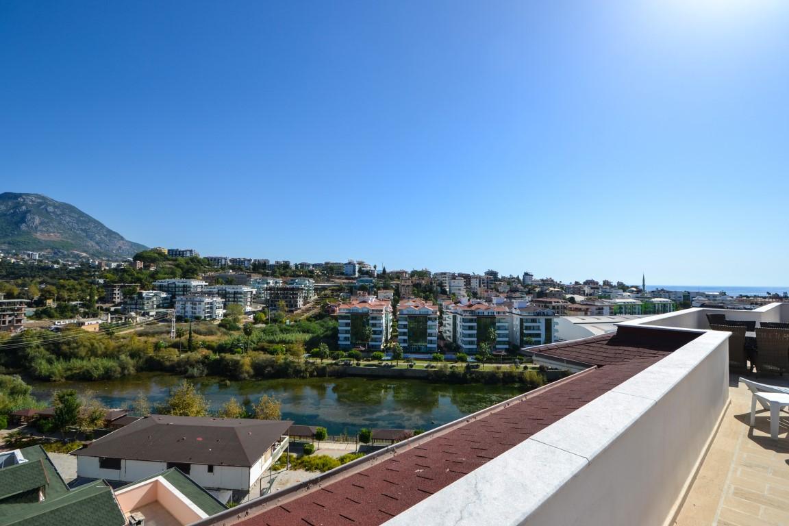 Penthouse 4+1 with panoramic view of the sea and the river Dim, in the center of the Tosmur district, Alanya (furnished) - Фото 32