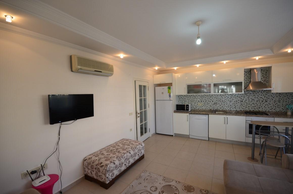 Apartment 1+1, 62 m2 in Tosmur, Alanya - Фото 11