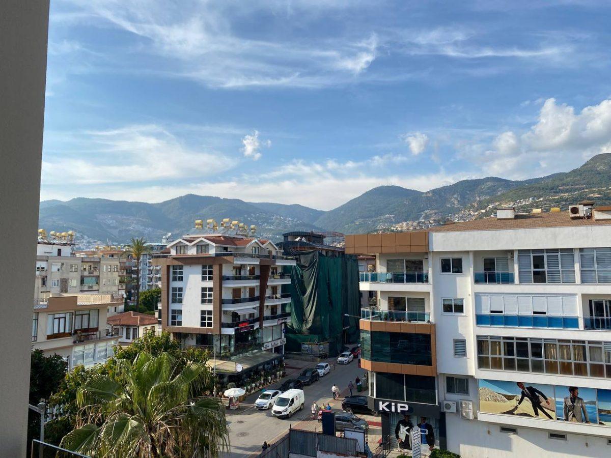 Two bedroom apartment (2+1) in the heart of Alanya with a view of the mountains - Фото 24