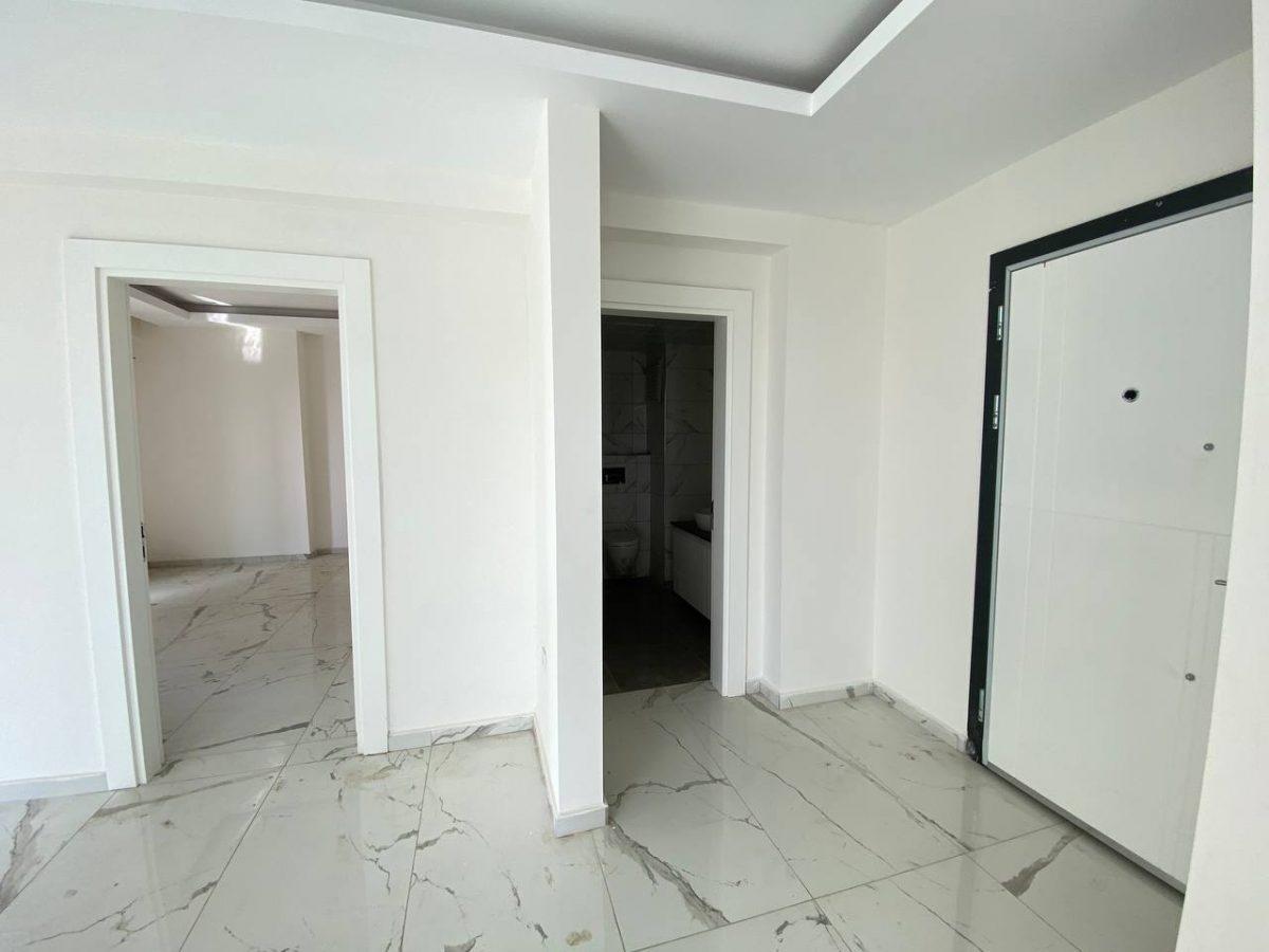 Two bedroom apartment in a new complex in the Mahmutlar district (Alanya) - Фото 18