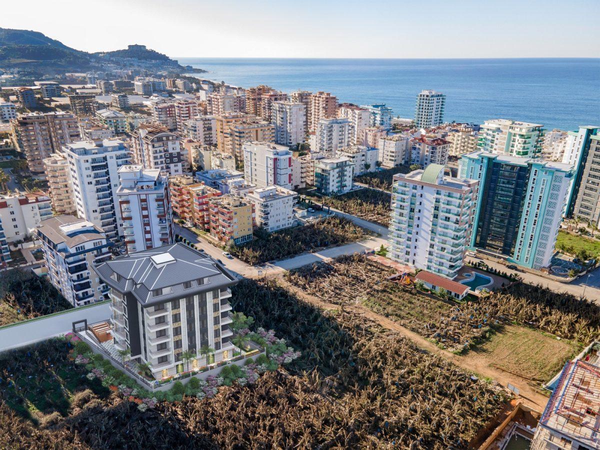 2+1 apartment in the Mahmutlar area near the sea - Фото 16