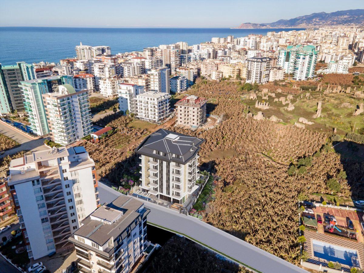 2+1 apartment in the Mahmutlar area near the sea - Фото 17