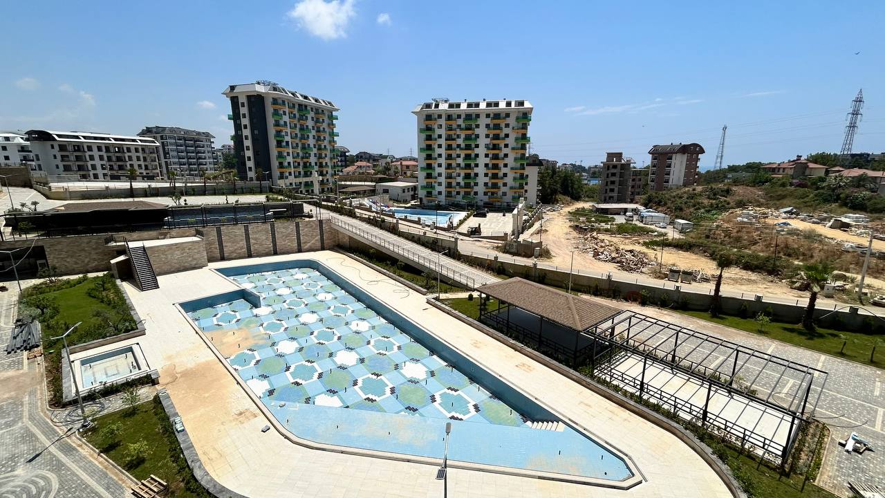 One bedroom apartment in the Mahmutlar area in a complex with various infrastructure - Фото 19