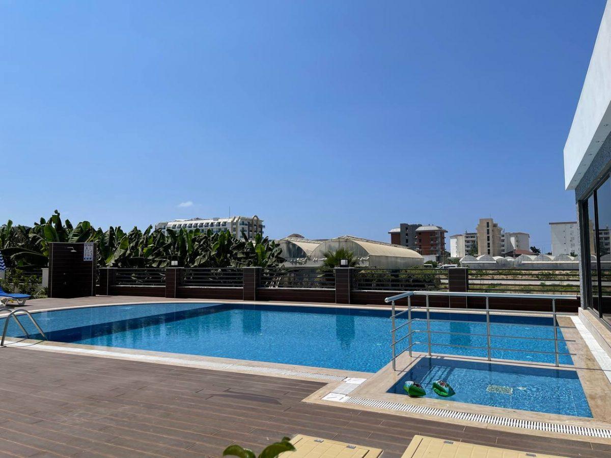 Furnished 2+1 apartments near the sea in the Kargicak area - Фото 2