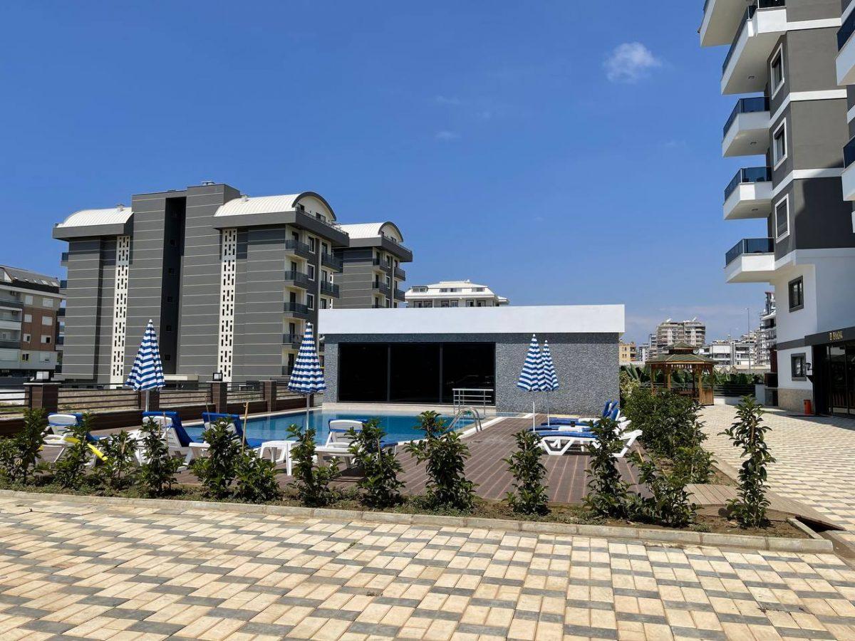 Furnished 2+1 apartments near the sea in the Kargicak area - Фото 8