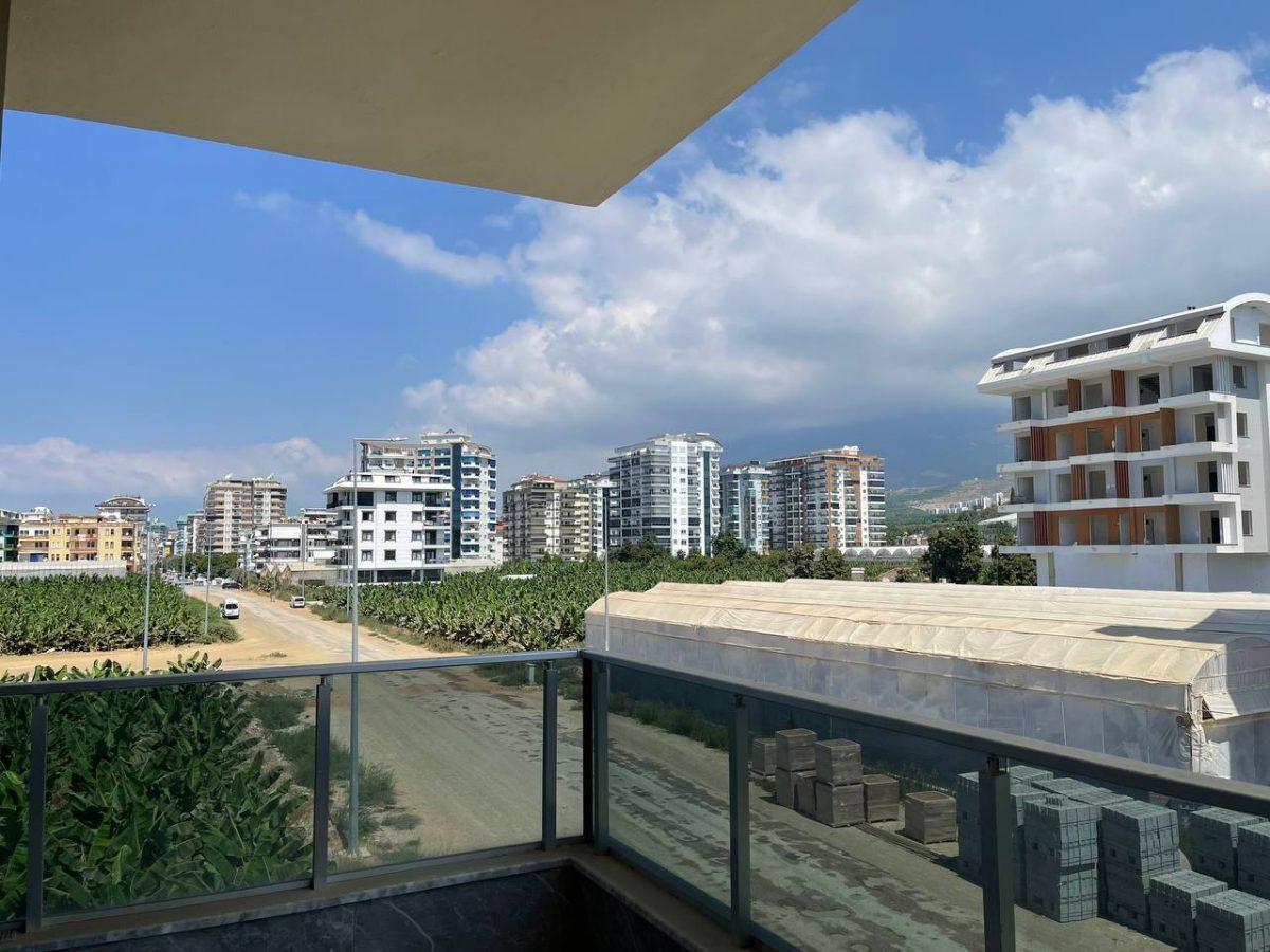 Furnished 2+1 apartments near the sea in the Kargicak area - Фото 34