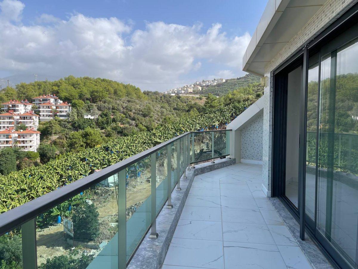 Spacious penthouse 3+1 next to the sea in the Kargyjak area - Фото 57