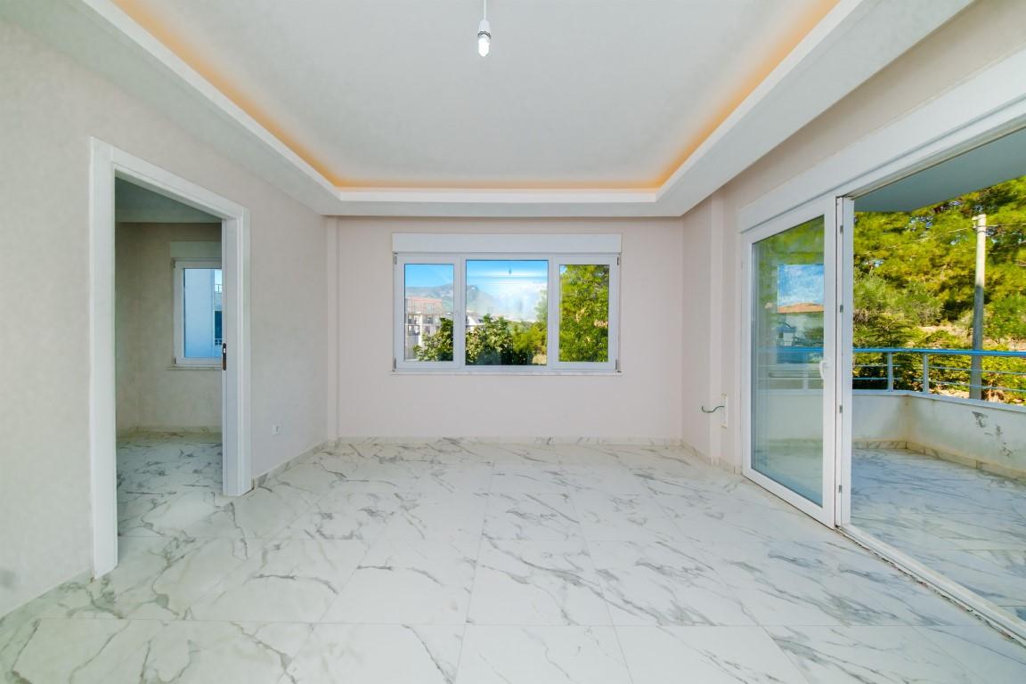 Bright two bedroom apartment of 85 m2 in the area of Oba, Alanya - Фото 19