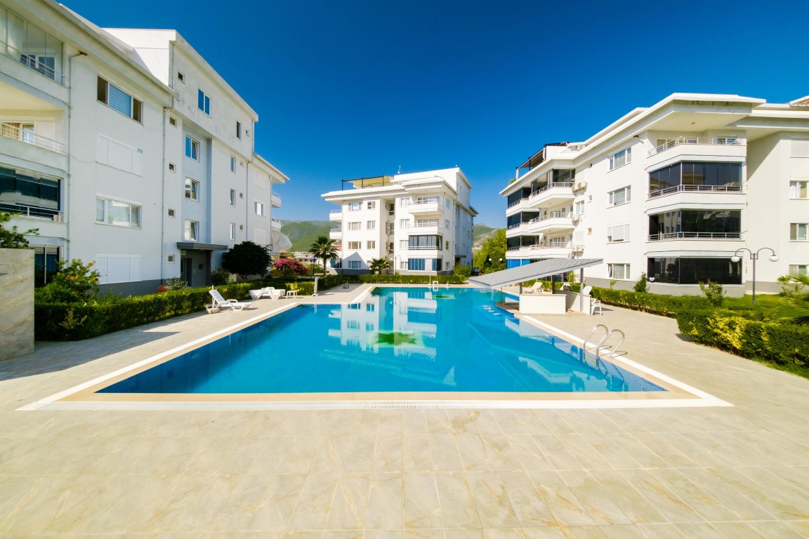 Bright two bedroom apartment of 85 m2 in the area of Oba, Alanya - Фото 6