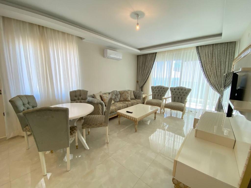 Two bedroom apartment on the high 11th floor, only 50 meters from the sea (Mahmutlar) - Фото 2