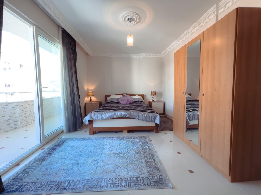 Furnished three bedroom apartment on the 7th floor and sea view, Mahmutlar - Фото 10