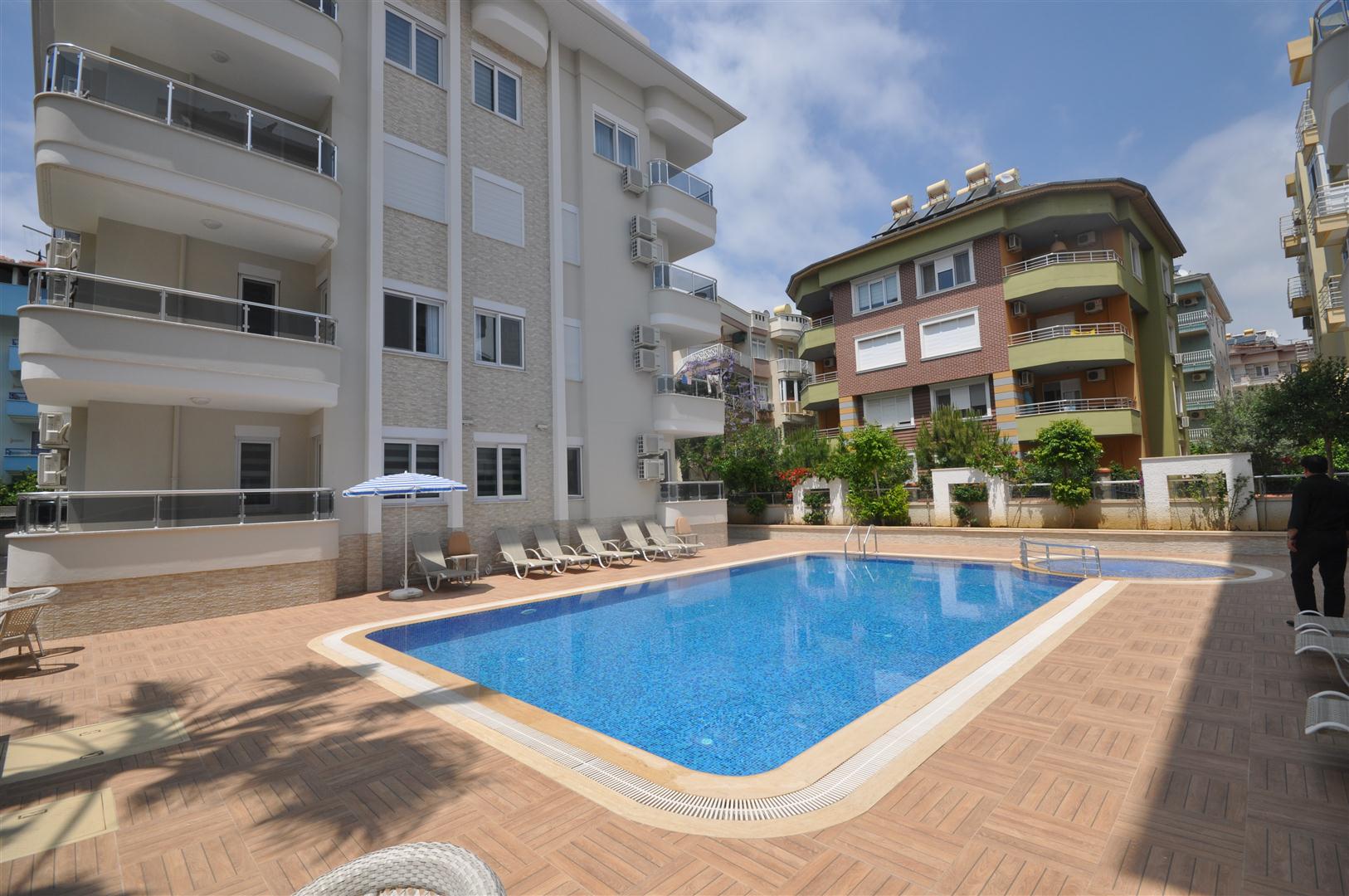 Two-room apartment on the ground floor in the prestigious area of Oba, Alanya - Фото 9