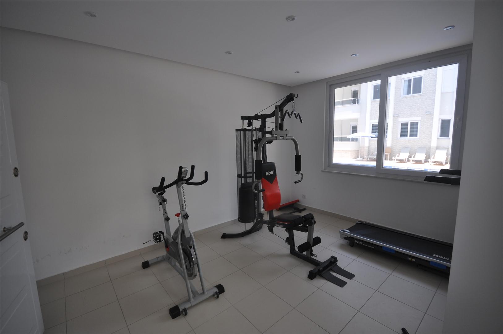 Two-room apartment on the ground floor in the prestigious area of Oba, Alanya - Фото 7