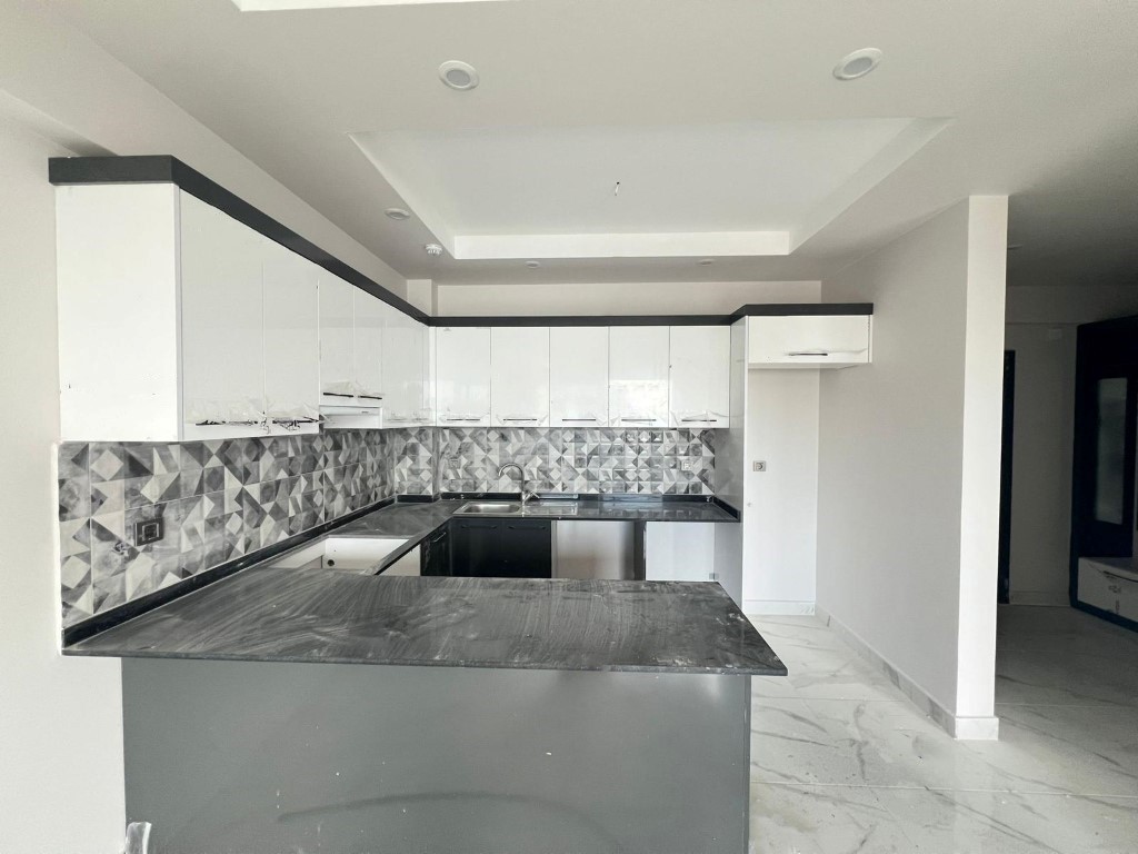 Apartments of 1+1 floor space of 78 m2 in Mersin - Фото 9