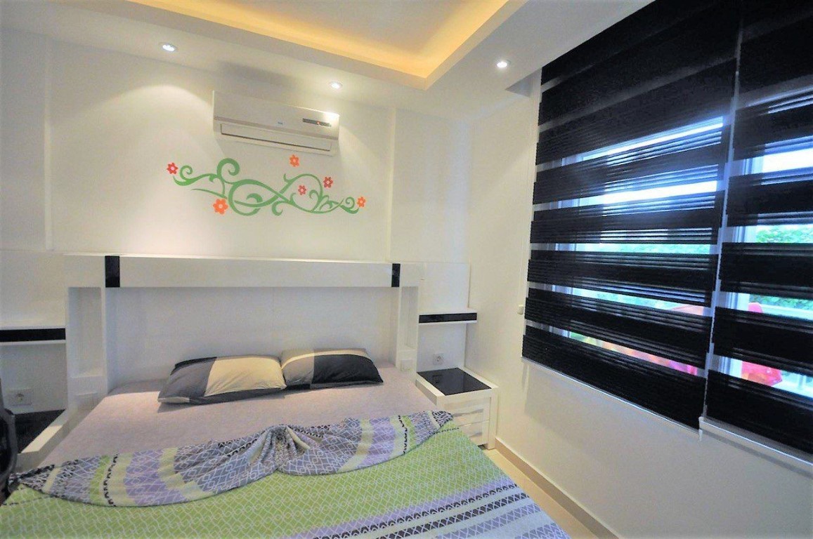 Two-room apartment on the ground floor in the prestigious area of Oba, Alanya - Фото 6