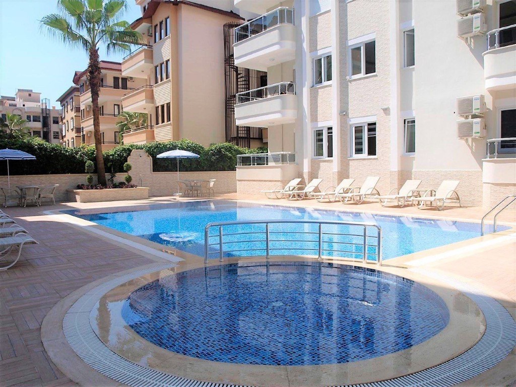 Two-room apartment on the ground floor in the prestigious area of Oba, Alanya - Фото 8