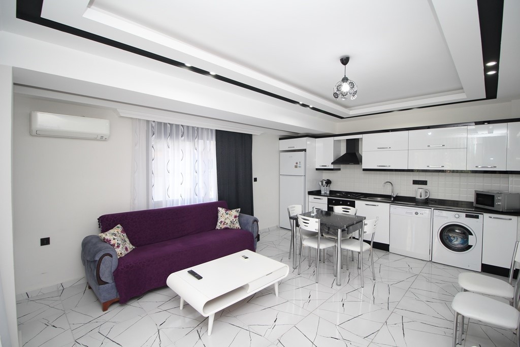 2+1 Apartment in the center of Alanya with rooftop relaxation area - Фото 3