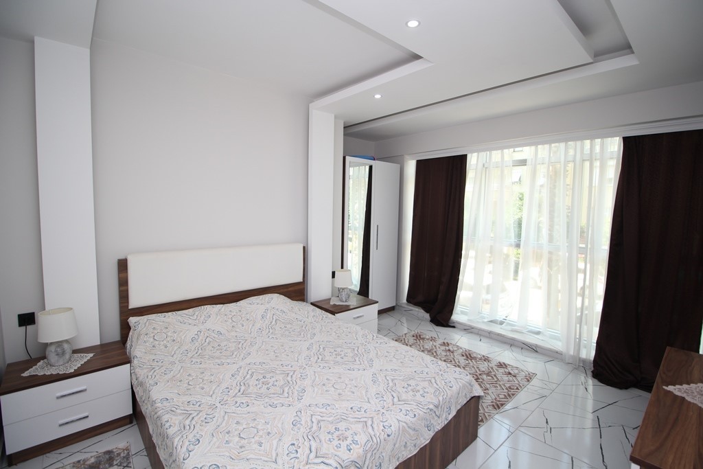 2+1 Apartment in the center of Alanya with rooftop relaxation area - Фото 10