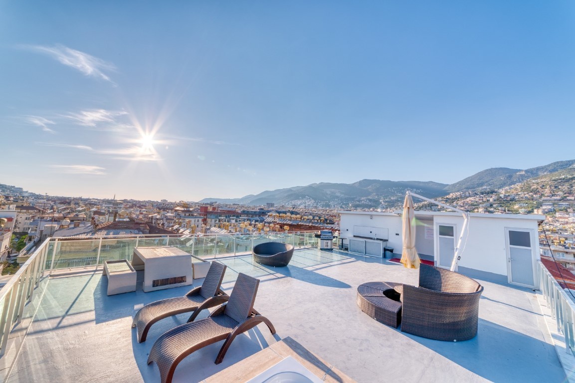 2+1 Apartment in the center of Alanya with rooftop relaxation area - Фото 15